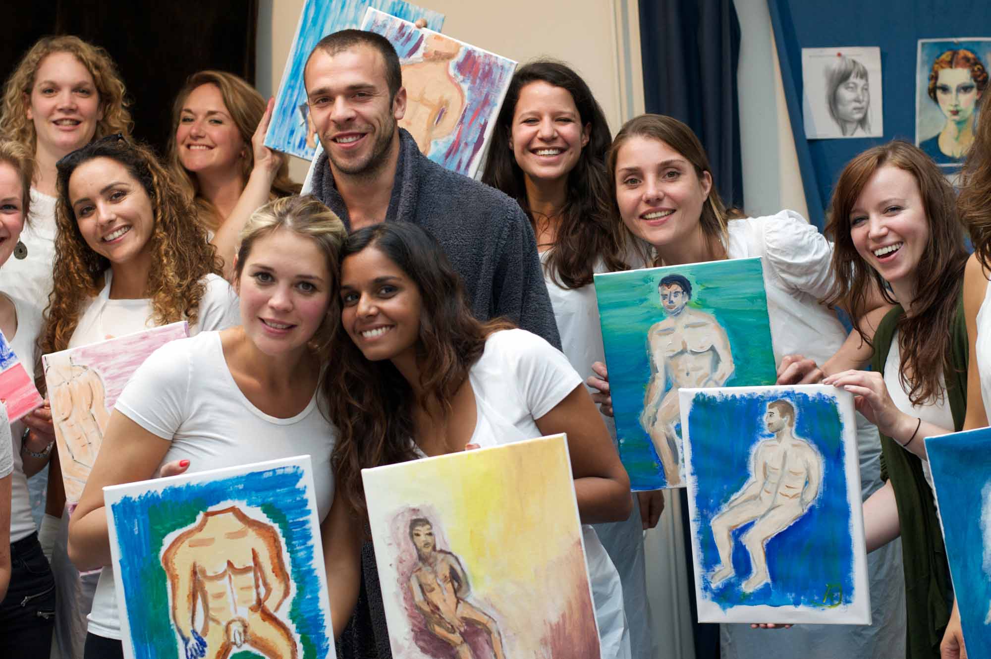 the colourful paintings, the hens and the nude model at the end of the hen party for a workshop life drawing in Amsterdam
